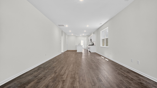 open concept living areas with revwood flooring