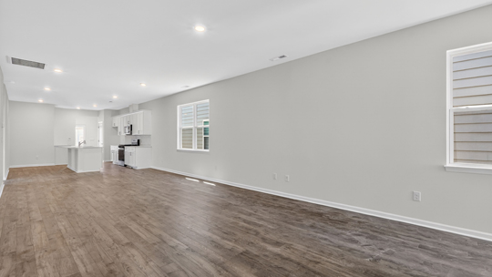 open concept living areas with revwood flooring