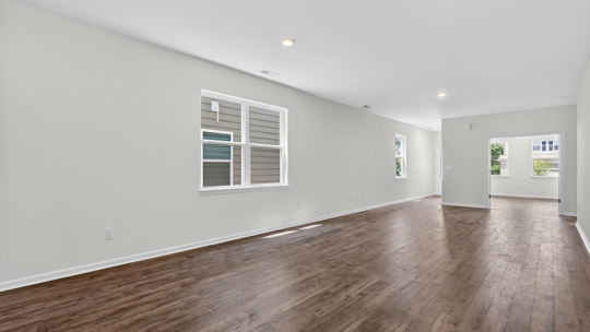 open concept living areas with revwood flooring