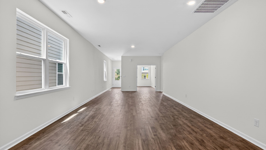 open concept living areas with revwood flooring
