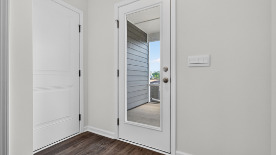 back door to covered and screened patio