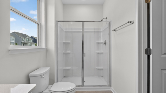 bathroom with glass door walkin shower