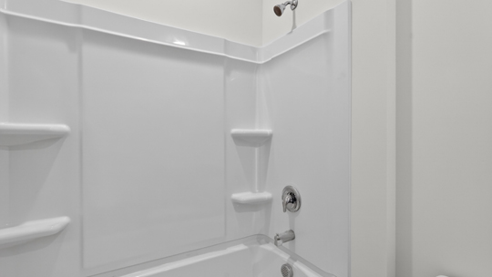 bathroom with tub shower combo