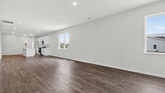 open concept living space with large windows