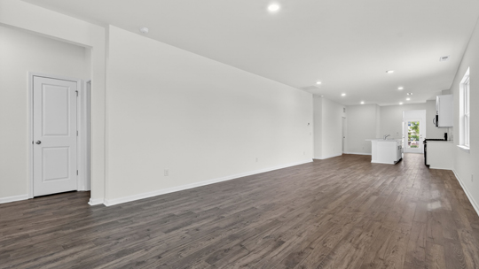 open concept living space with large windows