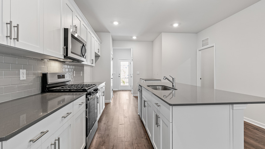 Kitchen with white cabinets