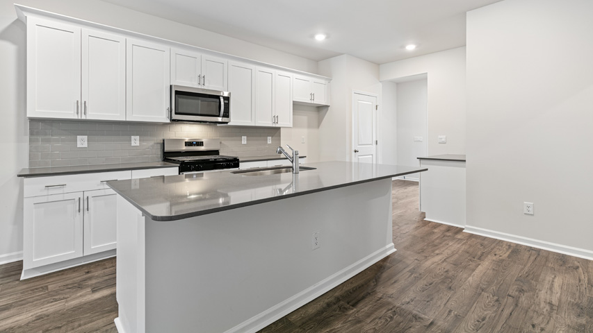 Kitchen with white cabinets