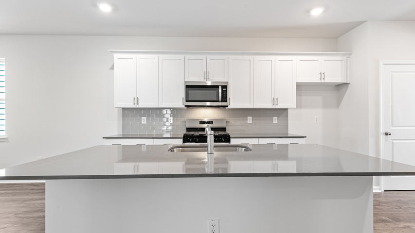 Kitchen with white cabinets