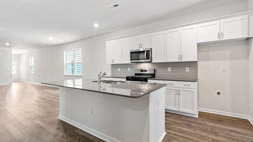 Kitchen with white cabinets