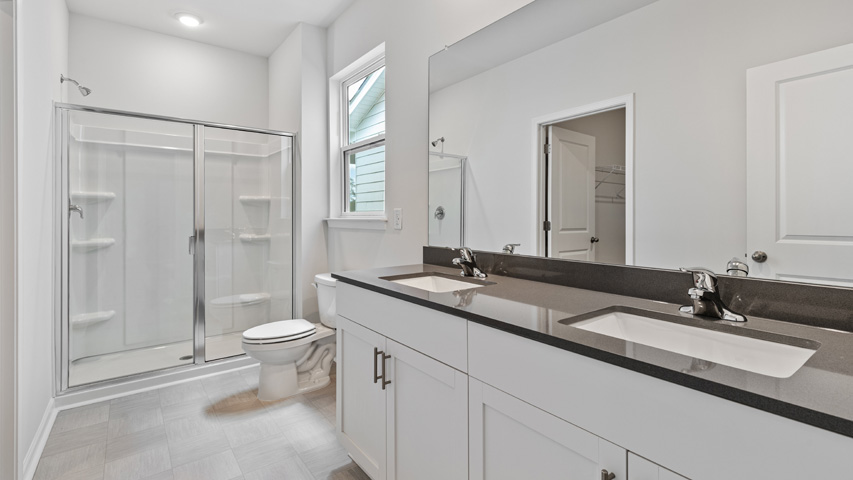 Bathroom with white cabinets