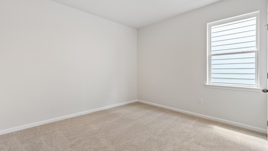 Bedroom with carpet