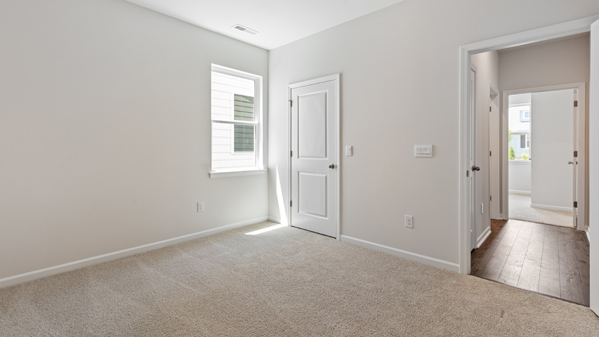 Bedroom with carpet