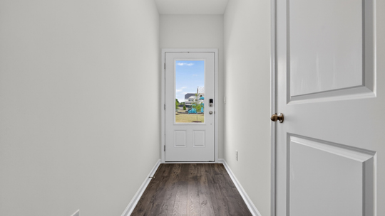 entryway foyer with revwood flooring
