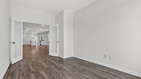 study with revwood flooring and glass french doors