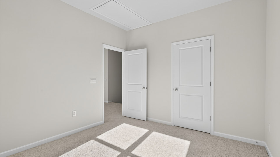 Bedroom with carpet floor and closet