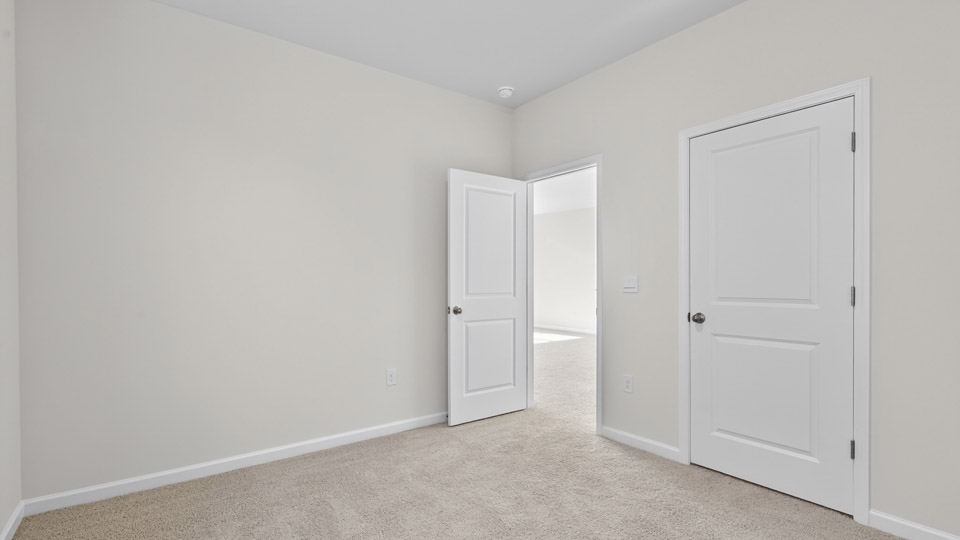 Bedroom with carpet floor and closet
