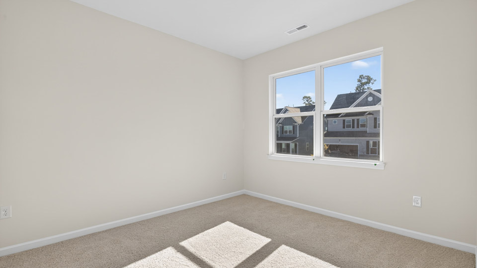Bedroom with carpet floor and closet