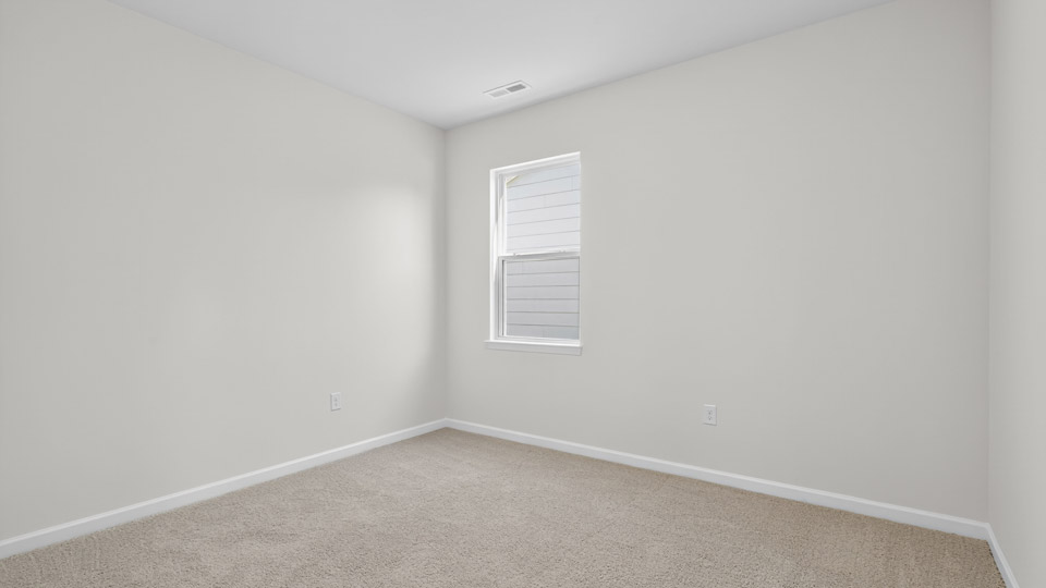 Bedroom with carpet floor and closet