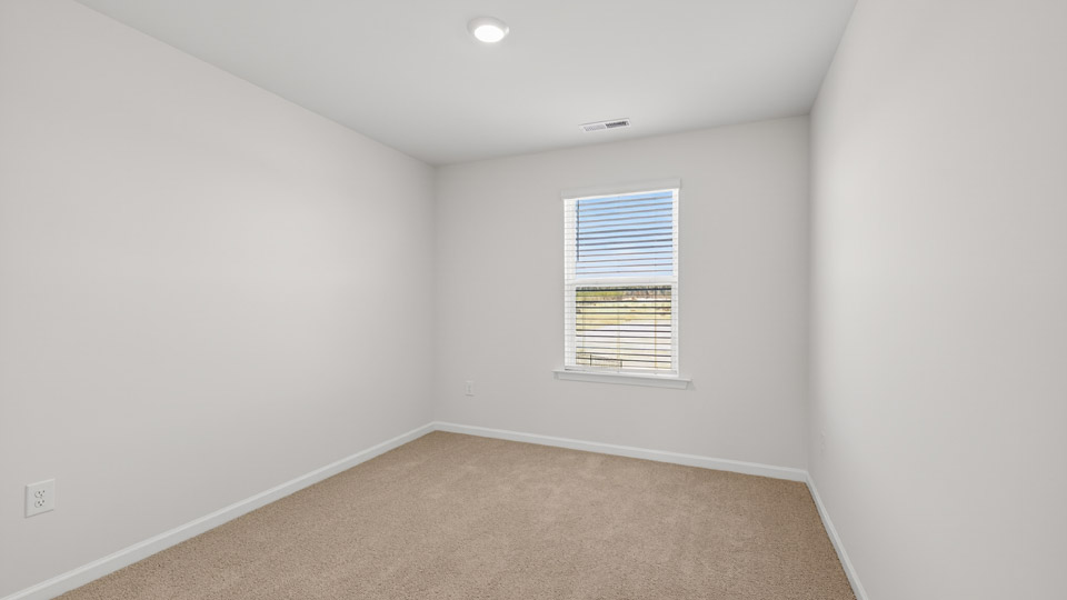 Bedroom with carpet floor and closet