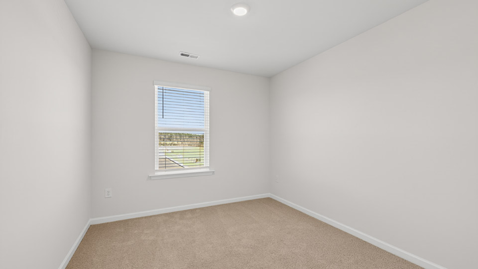 Bedroom with carpet floor and closet