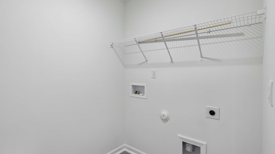 laundry room with wire shelving