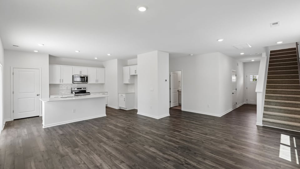 open concept living space with large windows