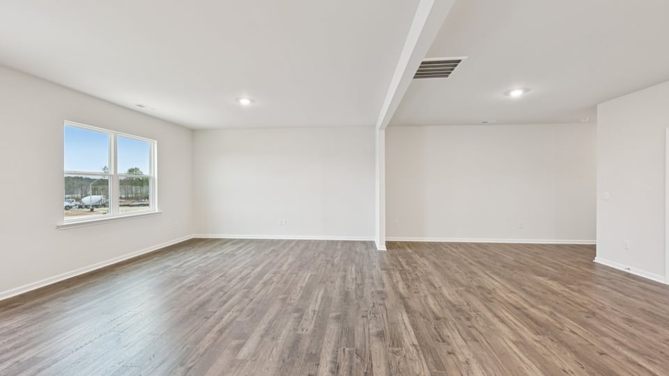 living room with revwood flooring