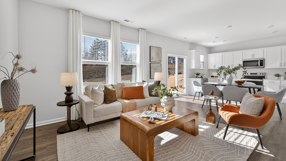 open concept living room with revwood flooring