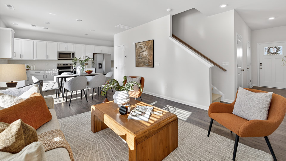 open concept living room with revwood flooring