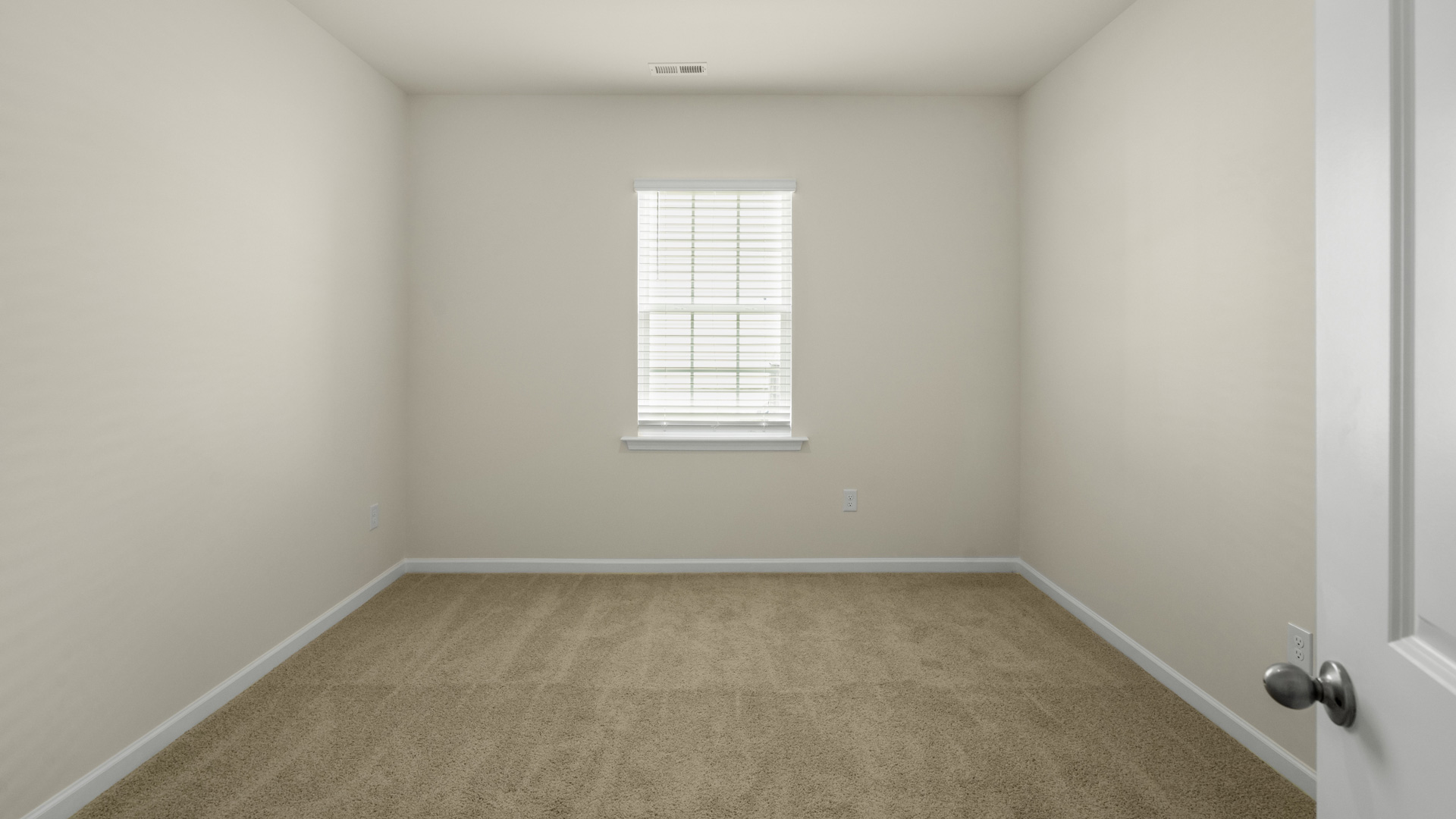 additional bedroom with window, carpeting, closet