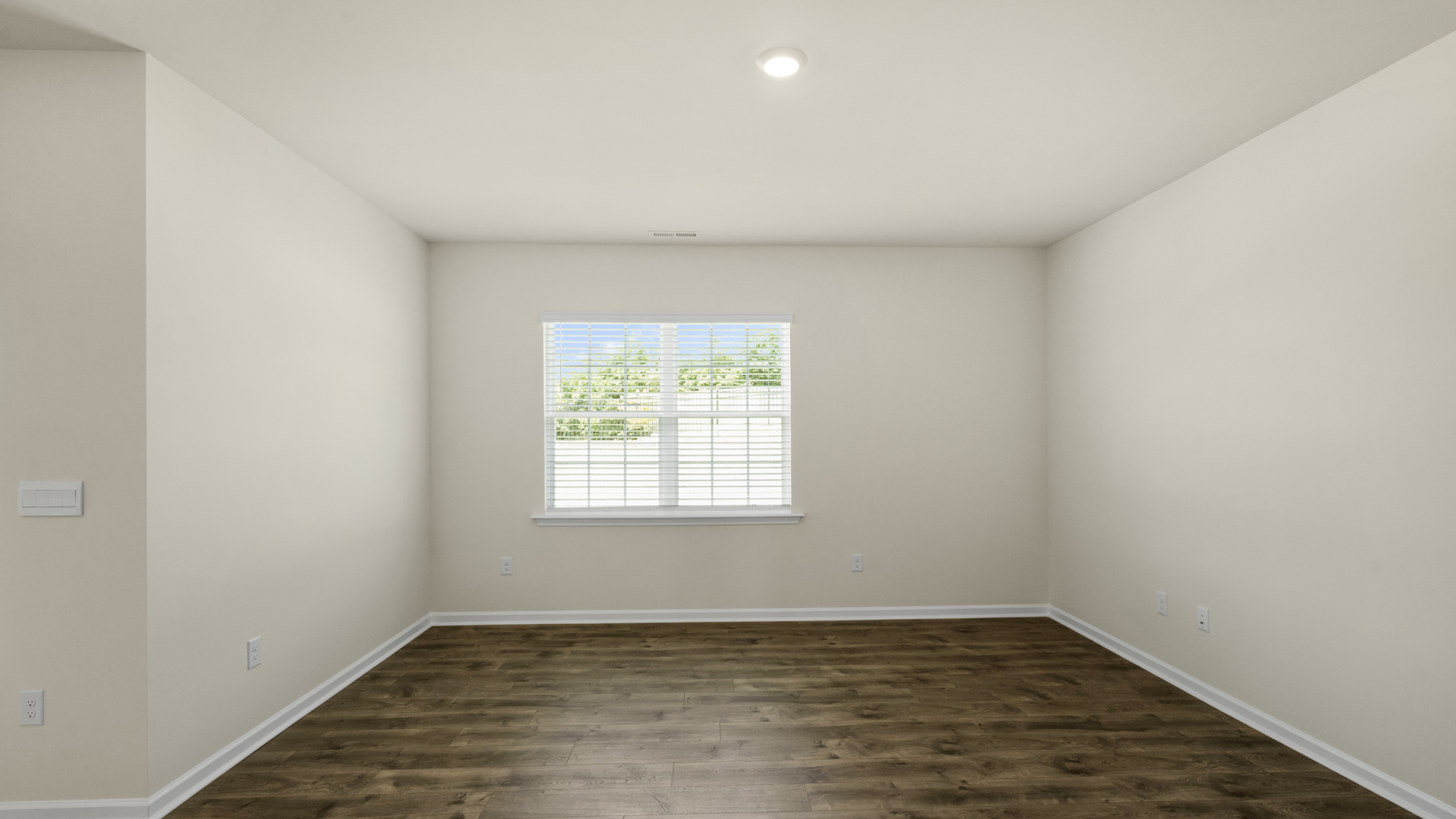 open concept living space with large windows