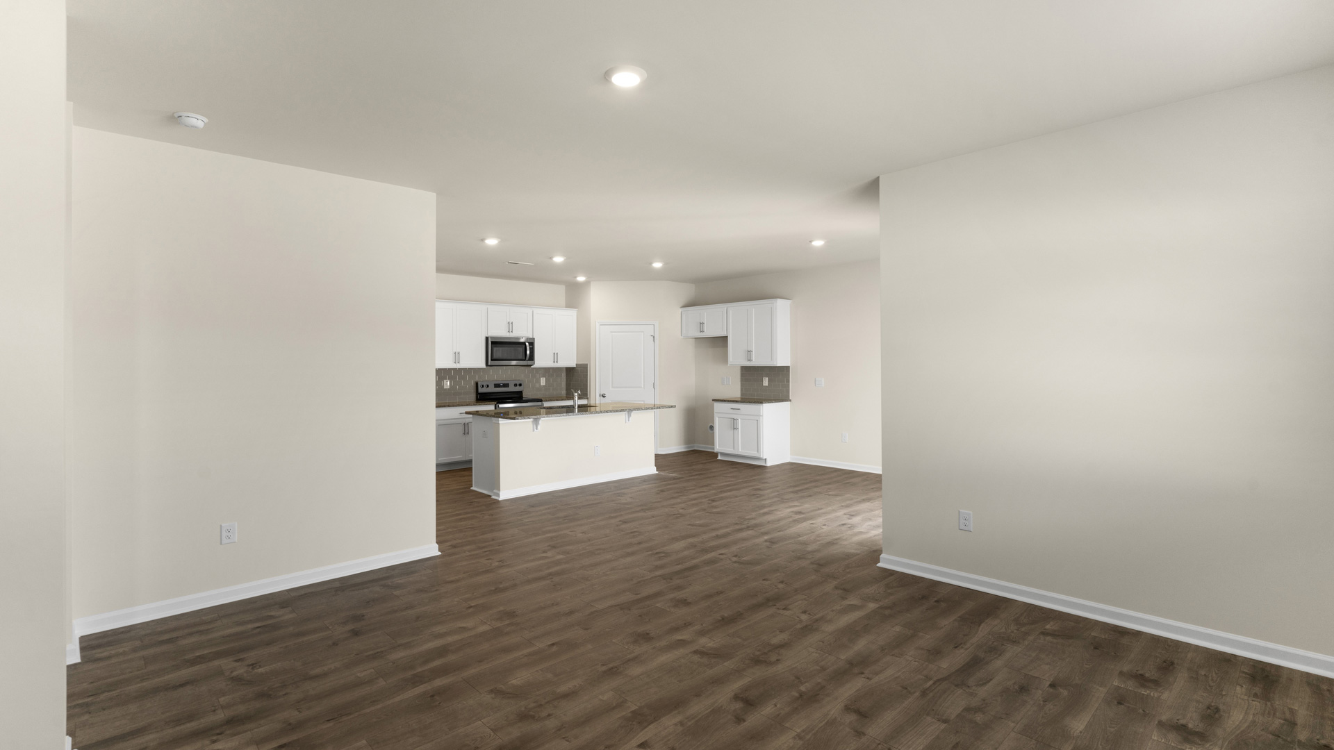 open concept living space with large windows