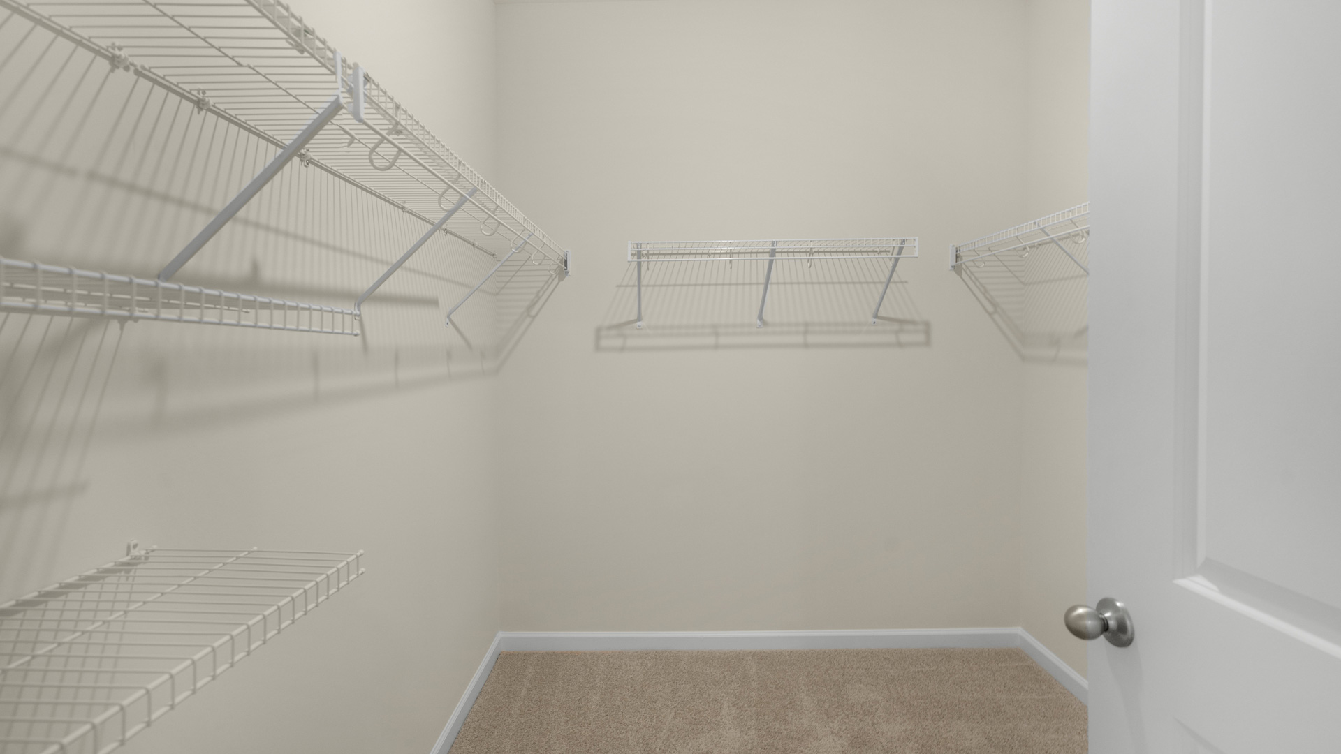 walk in closet with wire shelving