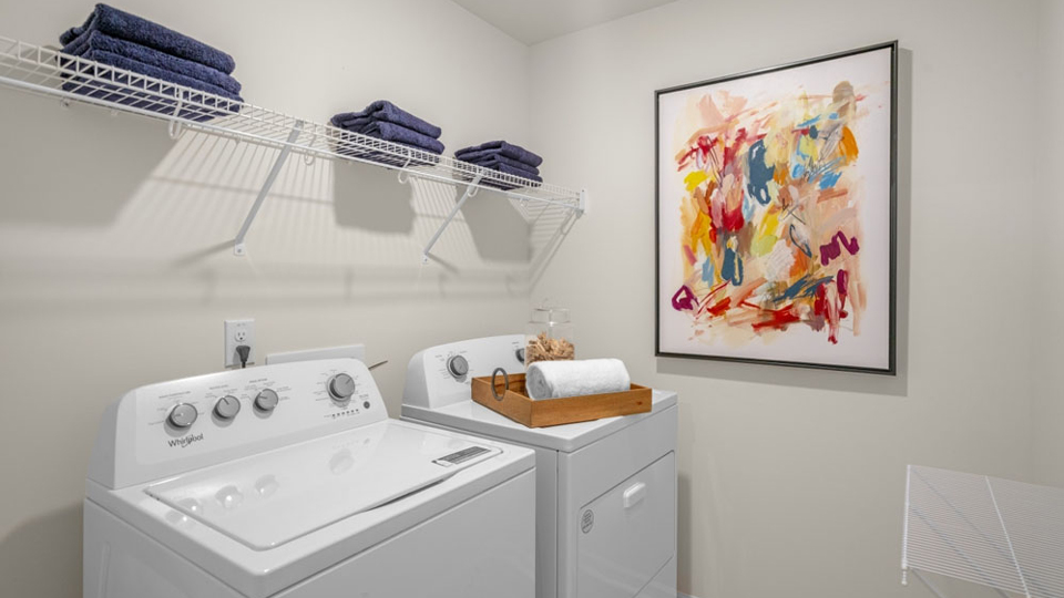 laundry room with washer and dryer