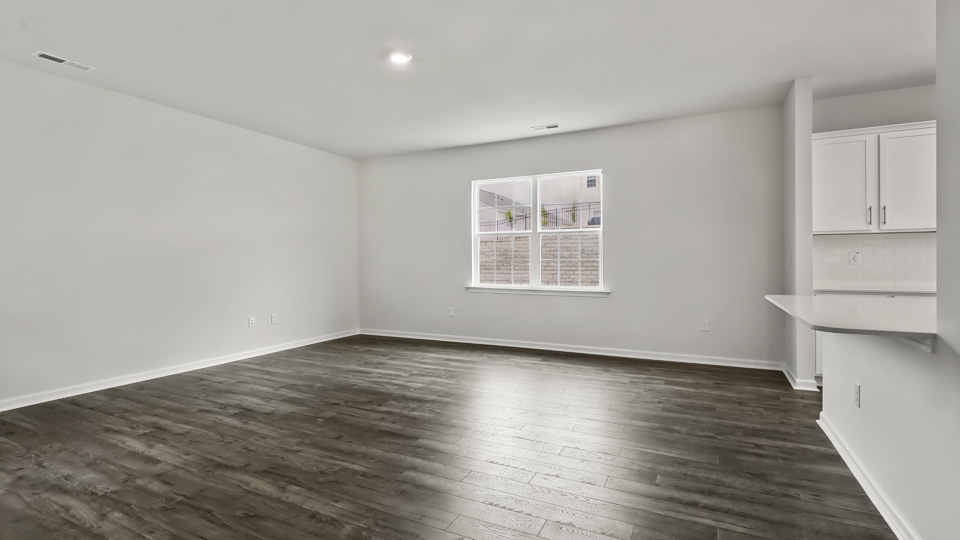 open concept living space with large windows