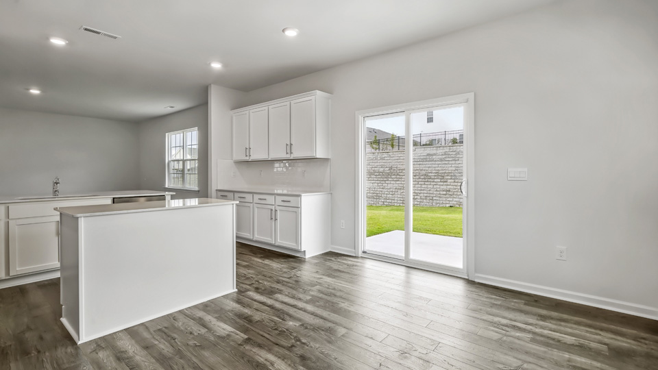 open concept living space with large windows