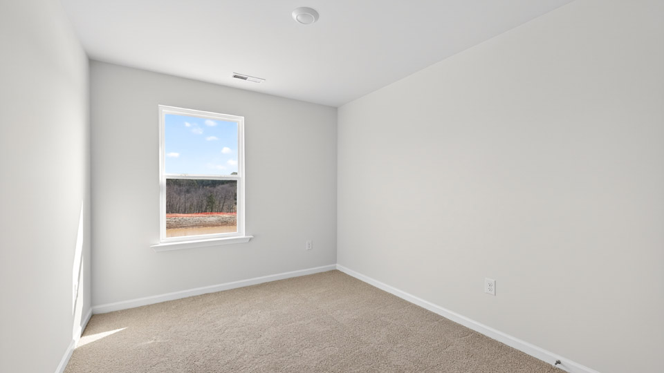 Bedroom with carpet floor and closet