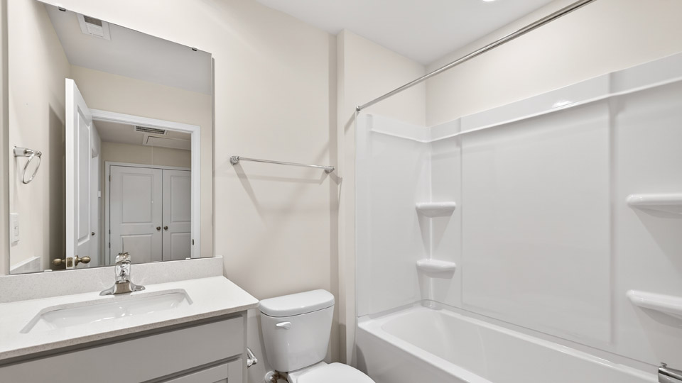 Bathroom with sink and tub