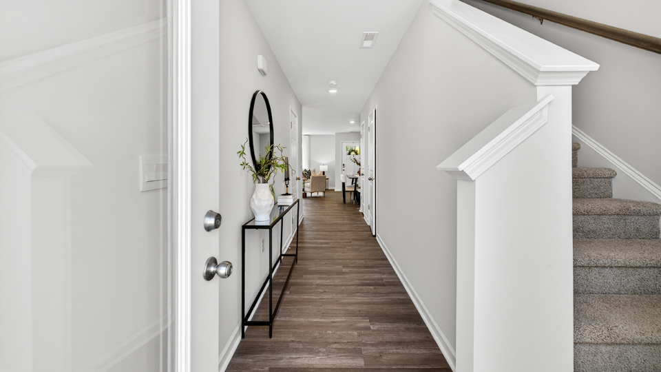 entryway with stairwell to right