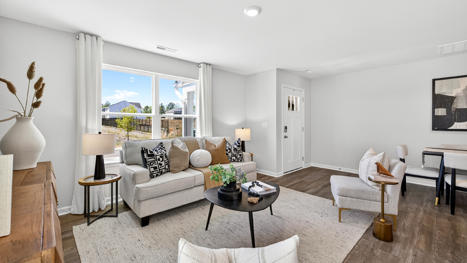 open concept living space with large windows