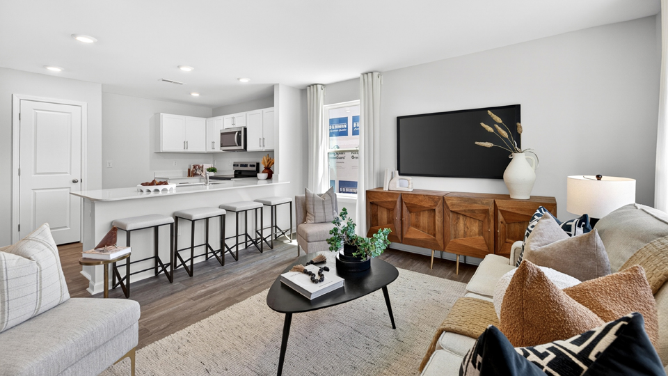 open concept living space with large windows