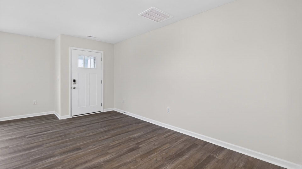 Front door entry leading to living room