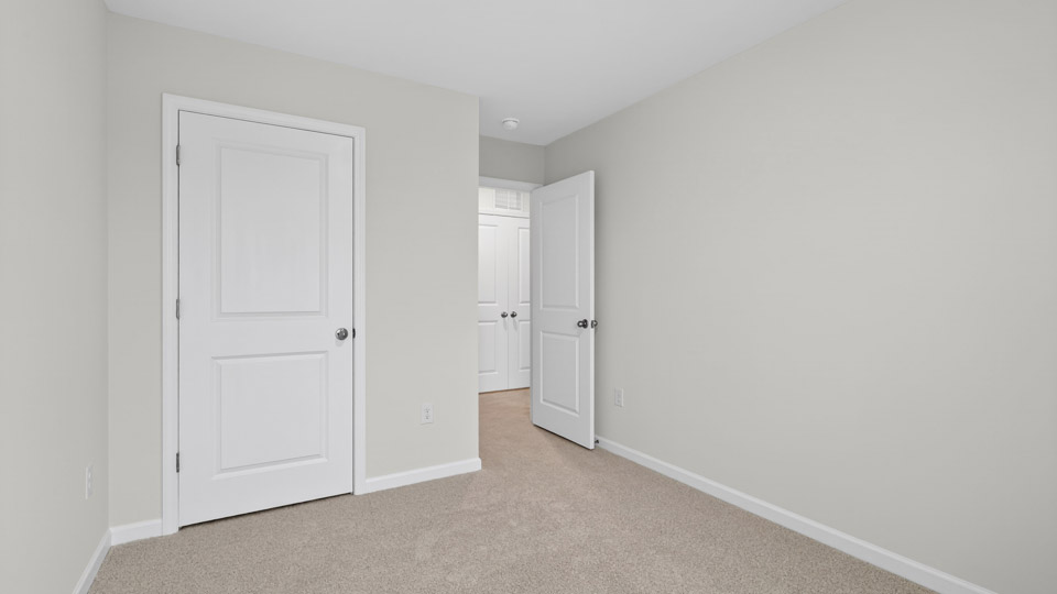 Bedroom with carpet floor and closet
