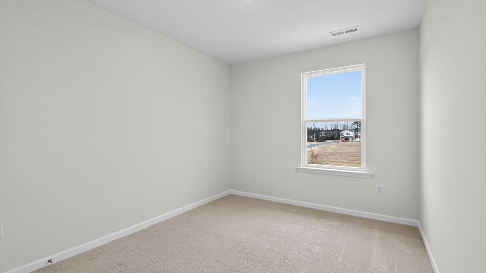 Bedroom with carpet floor and closet