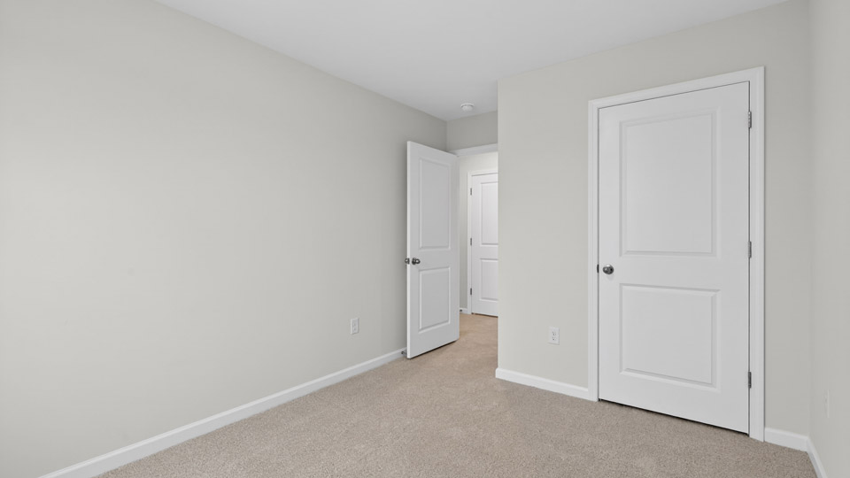 Bedroom with carpet floor and closet