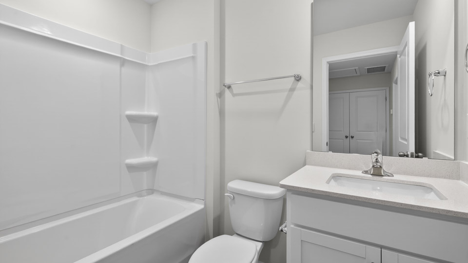 Bathroom with sink and tub