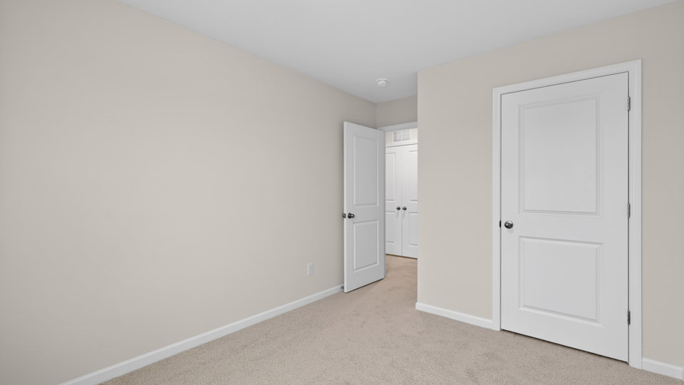 Bedroom with carpet floor and closet
