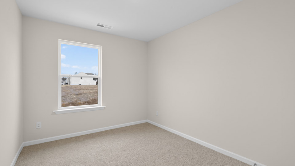 Bedroom with carpet floor and closet
