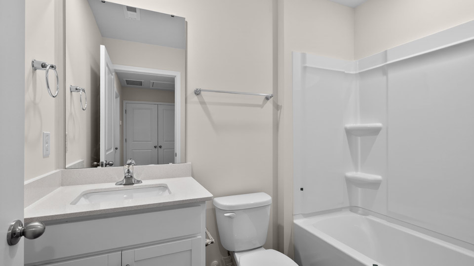 Bathroom with sink and tub