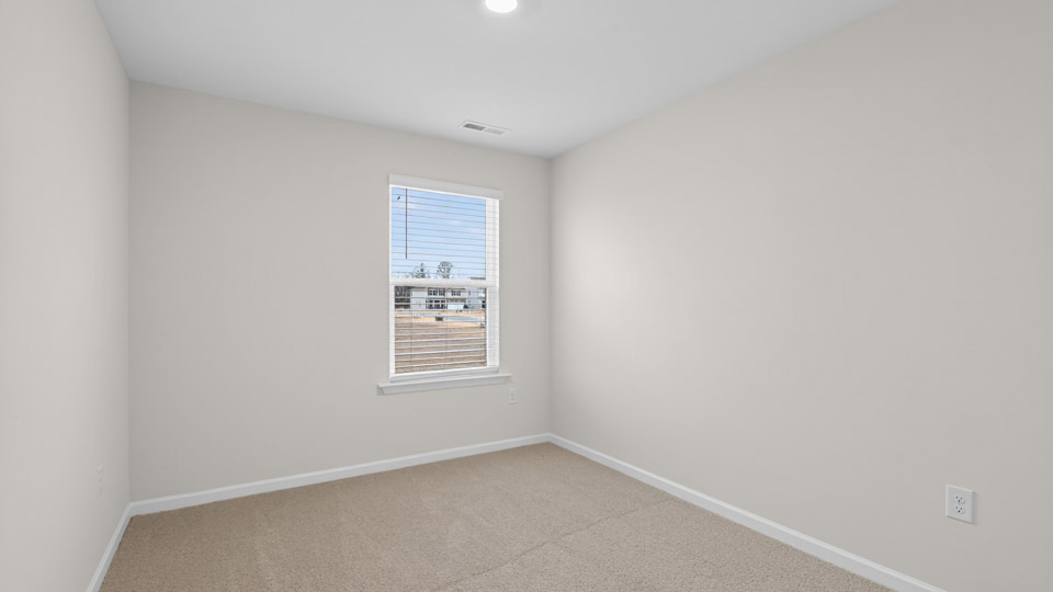 Bedroom with carpet floor and closet